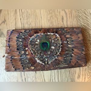 Vintage beautiful clutch with peacock feathers.